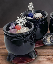 Load image into Gallery viewer, Cauldron candles for intention, color black made of ceramic dressed with herbs and crystals